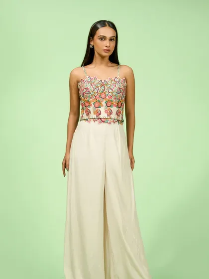 This extensive collection features a wide array of modern festive attire. From vibrant sharara sets and elegant anarkalis to chic jumpsuits and light lehengas, these pieces are curated for wedding guests and anyone looking for a stylish outfit for a special occasion.