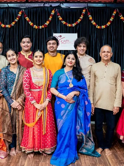 A group photograph with my esteemed gurus, family, and friends who graced the opening of my dance school. I am so grateful for this incredible support system.