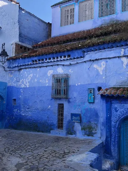 The famous "Blue Pearl" of Morocco, Chefchaouen. Walking through the narrow streets, every surface painted in shades of blue, is a surreal and therapeutic experience. It’s a powerful example of how color can define the identity of a place.