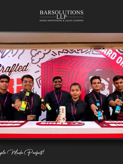 Our bartenders presenting the different varieties of Simba beer available for guests at the event.