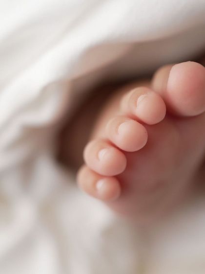 A macro shot of a newborn's perfect little foot. I focus on capturing these tiny details that change so quickly in the first few weeks.