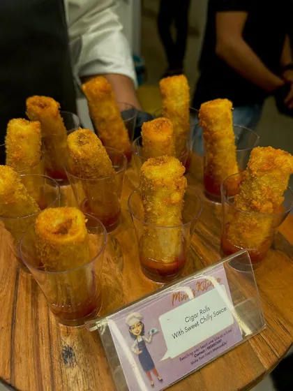 Crispy Cigar Rolls with a sweet chili sauce, another popular pass-around appetizer. The individual glass presentation is clean, convenient, and stylish.