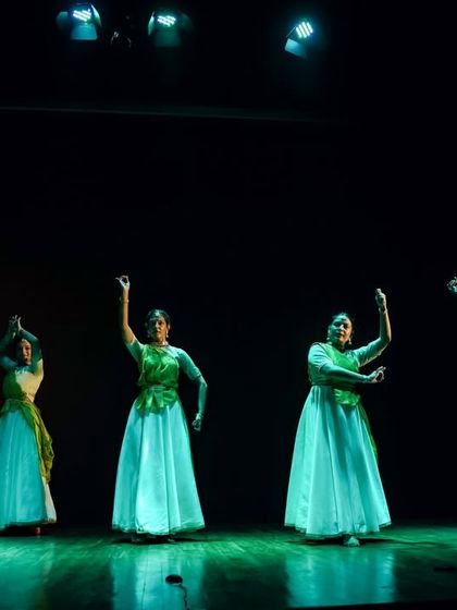 My ensemble performing a group choreography. The coordinated costumes and synchronized poses demonstrate the unity and precision required for a large-scale Kathak production.