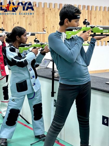 Back on the grid. Our shooters in their full gear, preparing for the State Championship. Practice is the only route to perfection.