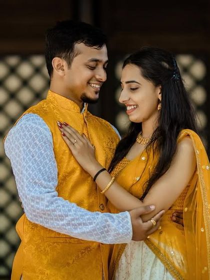A romantic portrait of a couple in their Haldi outfits. We take time to capture quiet, beautiful moments amidst the celebration.