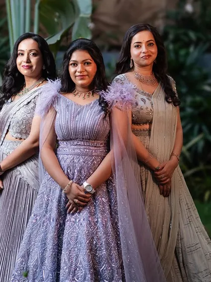 A gallery celebrating family bonds through fashion. These images feature more moments of mothers, sons, sisters, and other family members dressed in beautifully coordinated custom outfits for their most important events.