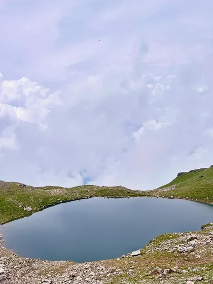 The serene and beautiful Bhrigu Lake, a high-altitude alpine lake that is the main attraction of the trek.