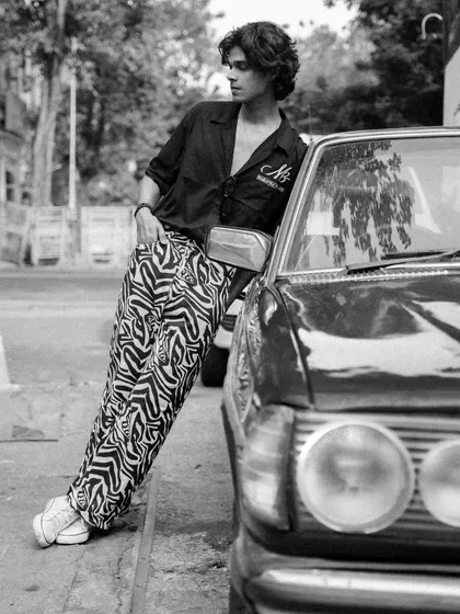 This series features a male model with a vintage Mercedes, shot in both color and black and white. It showcases a cool, retro vibe perfect for a fashion editorial or model portfolio.