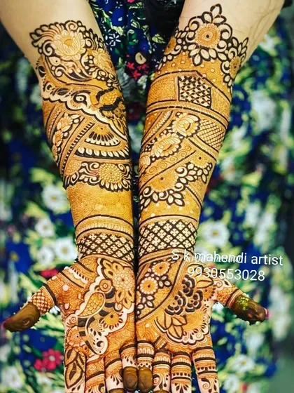 A vibrant and artistic design with a mix of floral and peacock motifs. The use of shading gives the patterns a beautiful depth.