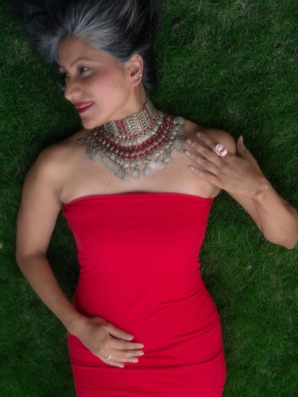 The same peaceful moment, celebrating the beauty of embracing your unique features and personal style.