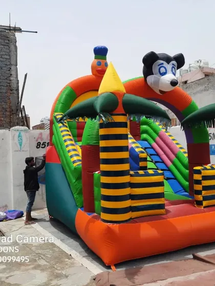 This is a 12 by 18 feet Mickey Mouse themed inflatable, which combines a jumping area with a slide. Combination units like this are always in demand because they offer two types of fun in one structure, giving your customers great value.