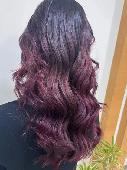 If you're feeling bold, a vibrant violet balayage makes a real statement. The color is concentrated on the mid-lengths and ends, allowing for a graceful grow-out.