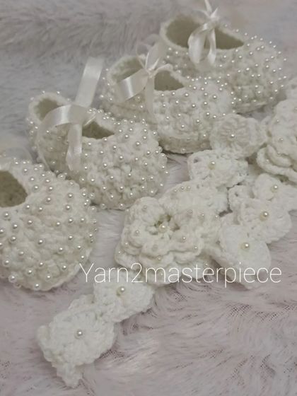 I had so much fun making this order for twins. Two identical pairs of my white beaded crochet booties with matching floral headbands, perfect for a special occasion like a baptism.
