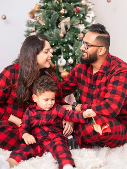 A candid moment of interaction during a Christmas mini-session. It's not just about the posed photo, but also the fun you have creating it.