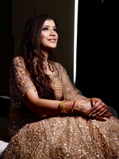 My client Harshita looking happy and radiant on her engagement day. The soft, natural light beautifully captures her glowing makeup.