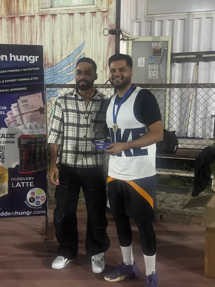 Another champion from team OGz with his medal and prize. The competitive spirit was high throughout the tournament.