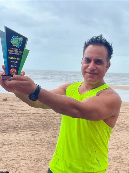 Celebrating Kapil Arora's win at the Lonavla Varsha 5km Run. He conquered the challenging course to take home the winner's trophy.