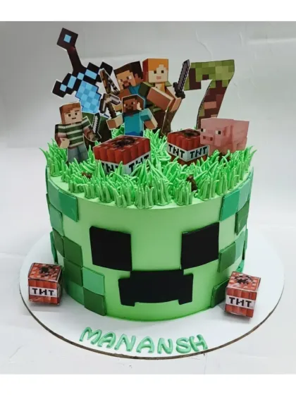 I built this Minecraft world with a fresh fruit cake base and lots of creative details. The Creeper design, TNT blocks, and character toppers are perfect for any young gamer's birthday party.