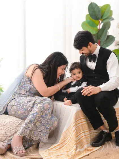 A gentle, loving moment with the whole family. I guide families into poses that feel natural and highlight their connection with each other.