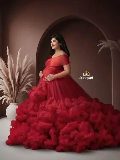 A hopeful, forward-looking pose by the window, beautifully capturing the anticipation of motherhood.