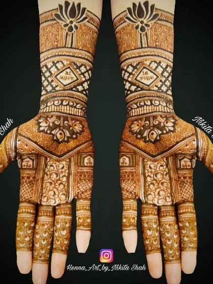 This is another example of a Tapasvi mehendi, designed for someone undertaking religious austerities. The pattern is dense and traditional, featuring lotus motifs at the wrist, symbolizing purity and enlightenment.