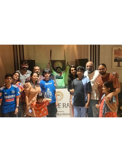 A family photo from the private party at The Coffee Bistro. It's amazing to see people of all ages enjoying the music together.