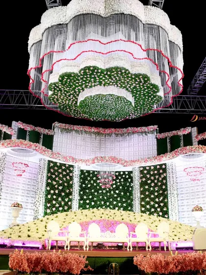 I believe in creating moments that leave everyone speechless. This magnificent, multi-tiered floral chandelier was the centerpiece of a grand reception, transforming the entire venue into a breathtaking spectacle of light and blossoms.
