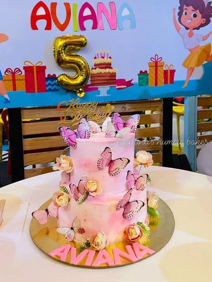 The butterfly cake at the 5th birthday party. It looks so beautiful on the celebration table.