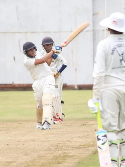 Kunal in action, playing a classic cover drive during a match. His technique and form are excellent.