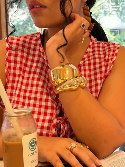 One more look at the statement cuff. Don't be afraid to go for bold, oversized jewelry.