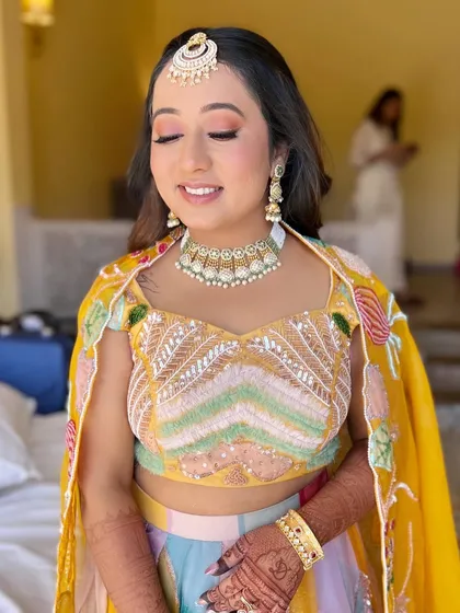 Varija looking serene and beautiful. The makeup is kept light and fresh, allowing her natural beauty to shine through.