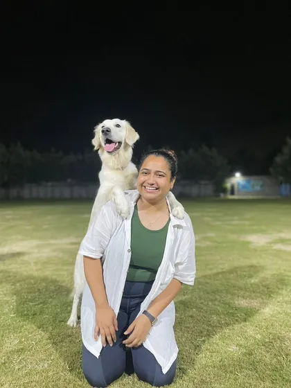 Hello! Your friendly neighborhood canine trainer here. Just a quick hello from me and a happy Golden Retriever, doing what we love most. I'm based in Noida and ready to help you with your dog.