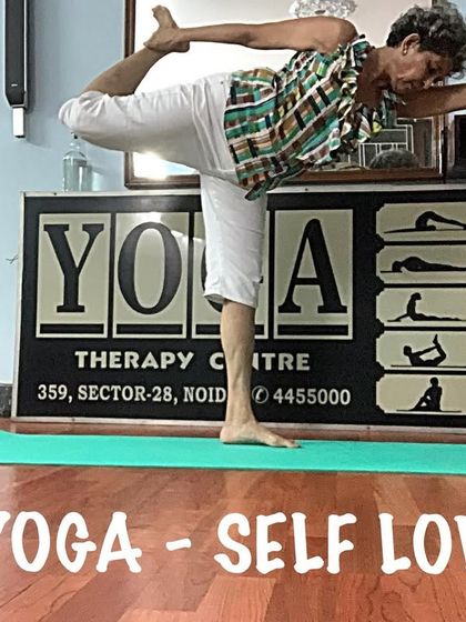 A variation of Dancer's Pose, showing the balance and flexibility required. It's a joyful and heart-opening posture.