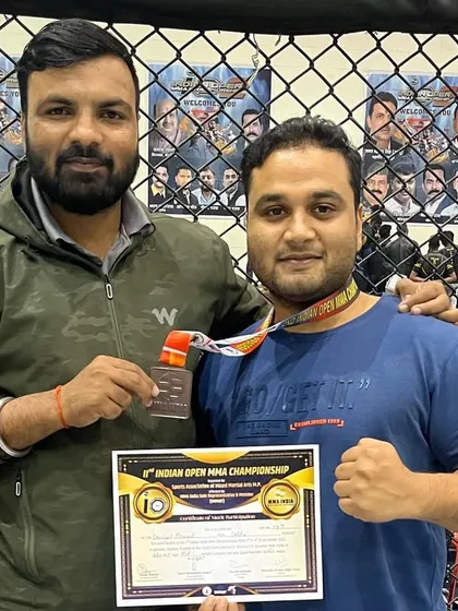 Another one of our fighters with his bronze medal. Every medal adds to the team's pride.