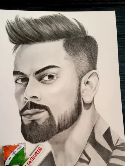 This photo shows my Virat Kohli sketch alongside the pencil I used. It gives a sense of scale and the tools behind the art.