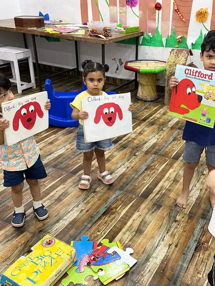 We recently did a read-aloud of 'Clifford the Big Red Dog'. The kids made their own Clifford art and we talked about the excitement and anxiety of starting school.