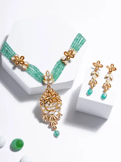Unparalleled Italian artistry from my exclusive collection. This set features French enamel infusing a precious stone allure, with a floral diamond pendant and emerald bead strands.