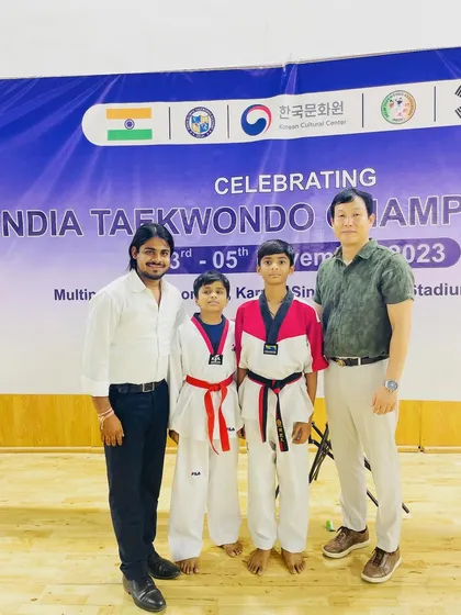 With Grand Master Lee at the All India Taekwondo Championship. Our two champions, Md. Kaif and Jay, won gold medals at this prestigious tournament.