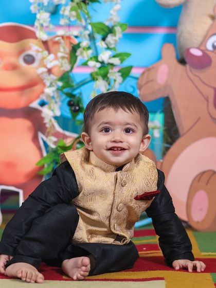 A magical 'Princess' themed birthday party, with elegant decor, shimmering backdrops, and royal props, making every little girl feel like royalty.