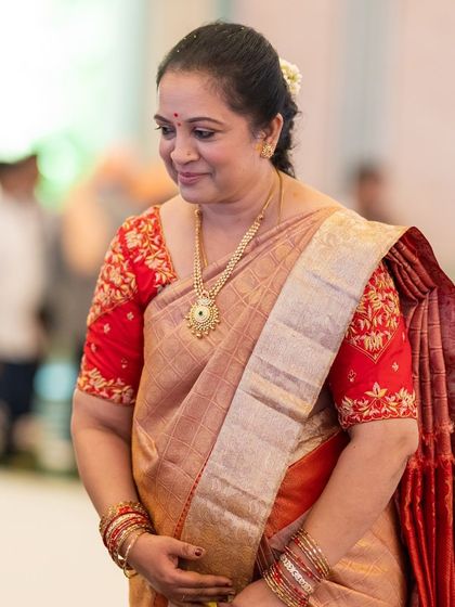 A mother’s love shines brightest, and her regal presence in our saree is breathtaking.