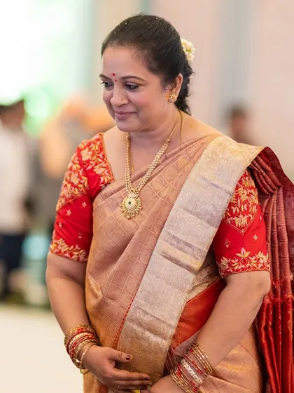 A mother’s love shines brightest, and her regal presence in our saree is breathtaking.