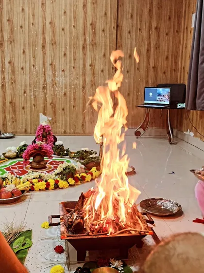 The sacred fire of the Surya Homa, a powerful ritual performed to invoke the energy of the sun and bring health and vigor to all participants.
