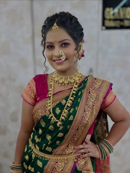 A beautiful smile from our model, showcasing the complete Maharashtrian bridal look we teach in our advanced course.