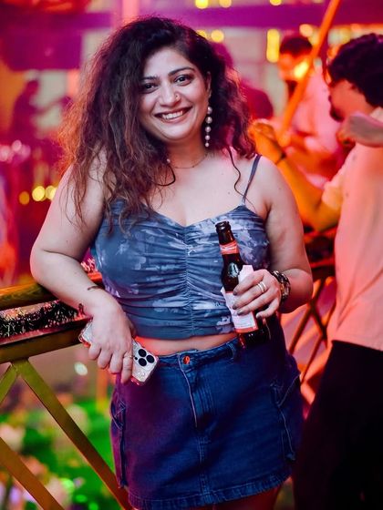 Taking a quick break from dancing to enjoy a drink and soak in the atmosphere at The Fixx.