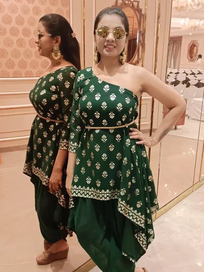 Mehendi ready. Even with a swollen eye, the show must go on. A pair of sunglasses and a smile is all it takes.