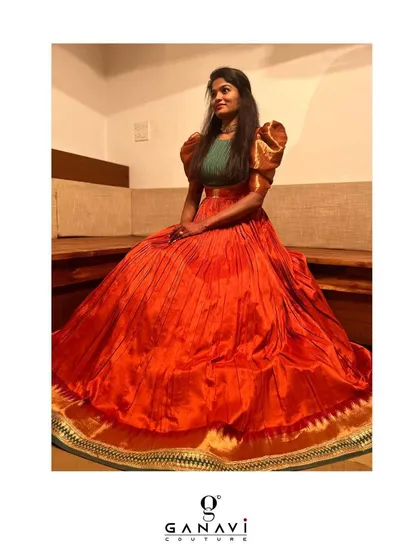 I specialize in transforming memories into modern heirlooms. This beautiful gown, with its dramatic puff sleeves, was created by upcycling a client's mother's treasured old saree into a stunning new piece.