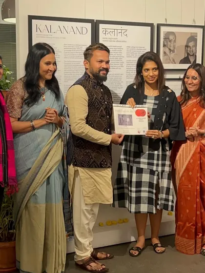 Receiving the award from the honorable panel at the Kamalayan Bajaj Art Gallery in Mumbai.