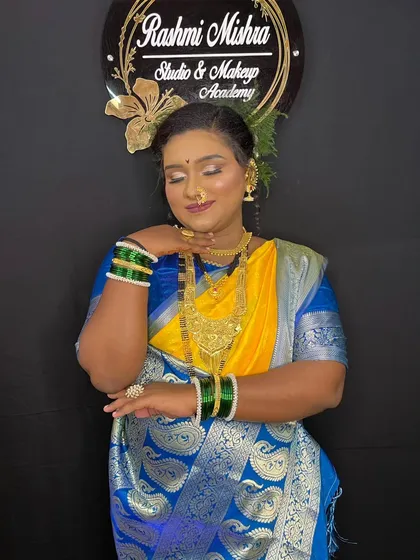 A duplicate of image 8, showing the stunning makeup on a dusky skin model.