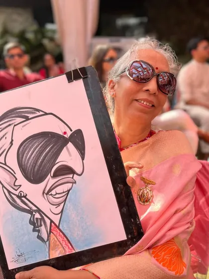 This guest's stylish sunglasses were a fun detail to include in her caricature. I love capturing unique accessories that reflect each person's personality.