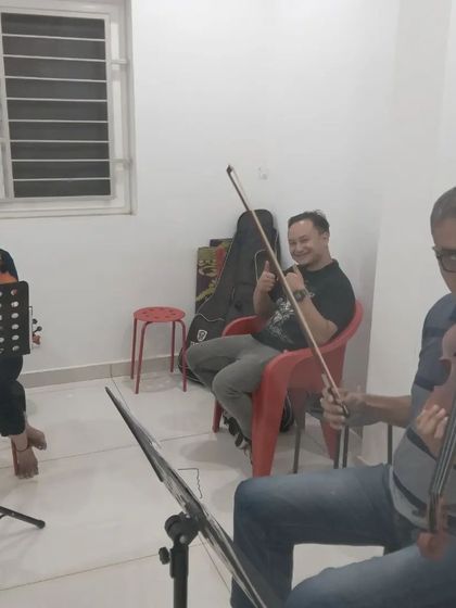 A violin class in session. Students of all ages can learn to play this beautiful instrument with us.